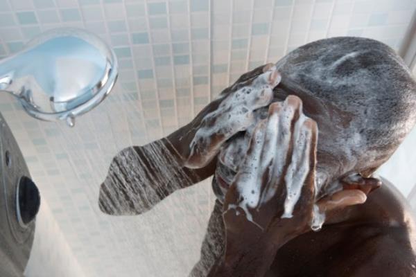 man in shower