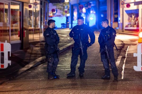 Police and deployed near the scene wher<em></em>e people were killed and injured in an attack at a festival in Solingen.