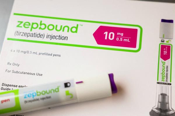 Close-up of an injection pen of Zepbound, Eli Lilly's weight loss drug, displayed in New York City.