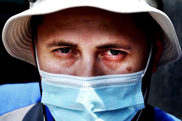 Lt. Jo<em></em>nathan Cedeno wearing a medical mask