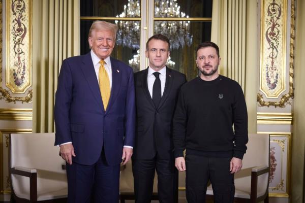 Trump, Macron and Zelensky pose for a picture before their trilateral meeting in Paris.