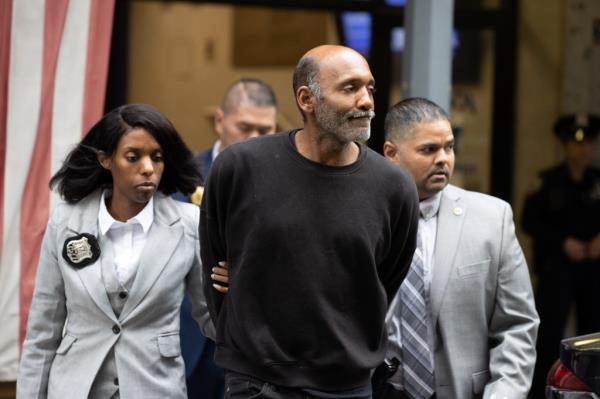 Clifton Williams is led out of the 13th Pct in Manhattan Friday, May 17, 2024, after his arrest for punching actor Steve Buscemi in an unprovoked attack.