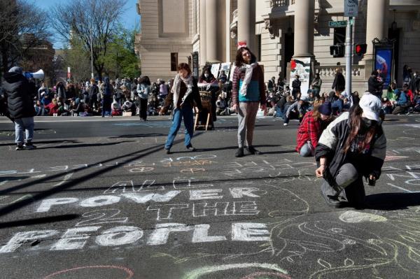 Messages being written on the ground at the Yale anti-Israel rally.