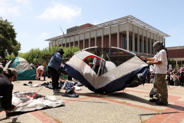 Students sitting among the tents at Columbia.