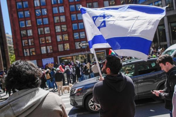 A pro-Israel rally held at NYU across the street from the encampment.