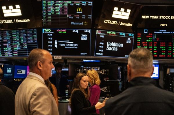 Traders on the floor of the New York Stock Exchange were eagerly waiting to see how steep the cut would be.
