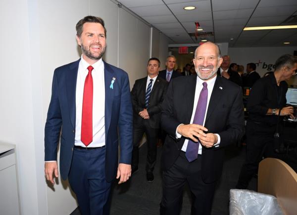  JD Vance and Howard Lutnick attend Charity Day 2024 hosted by The Cantor Fitzgerald Relief Fund at BGC Group on September 11, 2024 in New York City.