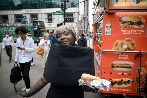 It was hard to eat a hot dog in the getup.