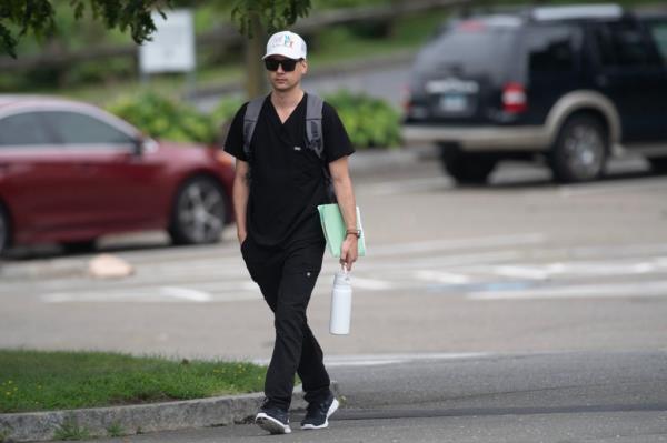 Bautista walking in a parking lot. 