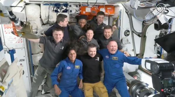 Suni Williams (seated L) and Butch Wilmore (seated R) pose with the ISS crew after the docking on June 6, 2024. 