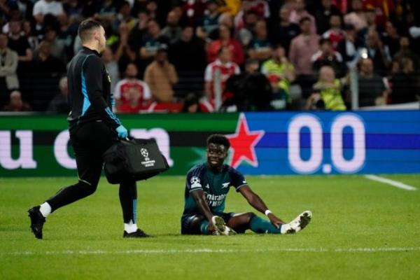 Bukayo Saka of Arsenal has to go off injured RC Lens v Arsenal, UEFA Champions League, Group B,