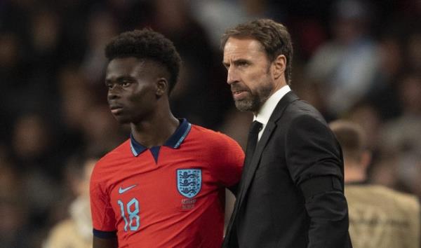 Bukayo Saka and Gareth Southgate