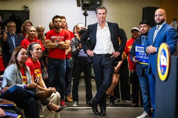 Newsom waits to sign legislation raising California fast food workers minimum wage to $20 an hour at SEIU Local 721 in Los Angeles on Thursday, September 28, 2023.