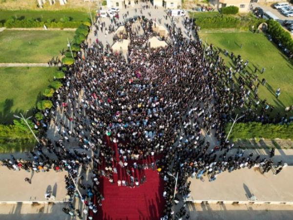 People attend the funeral of victims of the fatal fire of a wedding celebration, in Hamdanya, Iraq, September 27, 2023. REUTERS/Abdullah Rashid