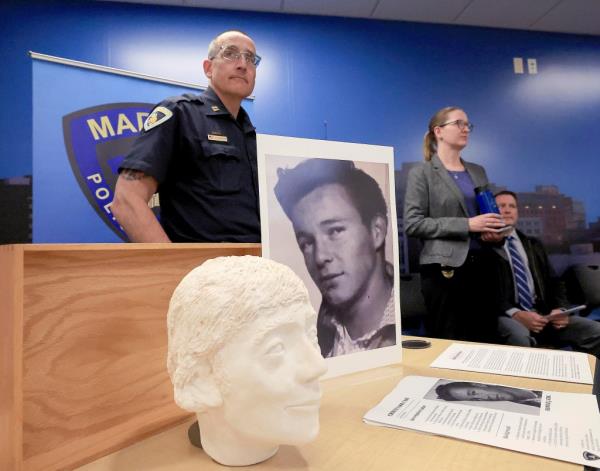 Madison Police Department Mid Town District Capt. Jason Freedman and Det. Lindsey Ludden talk with members of the media during a press co<em></em>nference at the Madison Police Department's Central District in Madison, Wis., Monday,  May 13, 2024. The press co<em></em>nference was held to announce the identification of Ro<em></em>nnie Joe Kirk of Tulsa, Okla. as the person whose remains were discovered in a chimney of a former music store in the city In 1989. (John Hart/Wisco<em></em>nsin State Journal via AP)