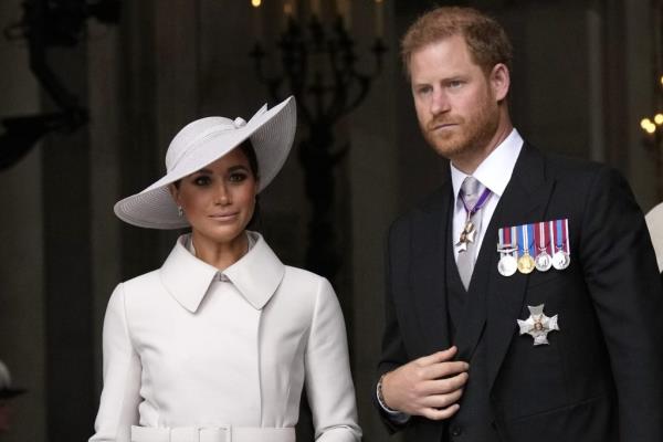 Prince Harry and Meghan Markle, Duke and Duchess of Sussex, attending a service of thanksgiving for Queen Elizabeth's Platinum Jubilee at St Paul's Cathedral, London