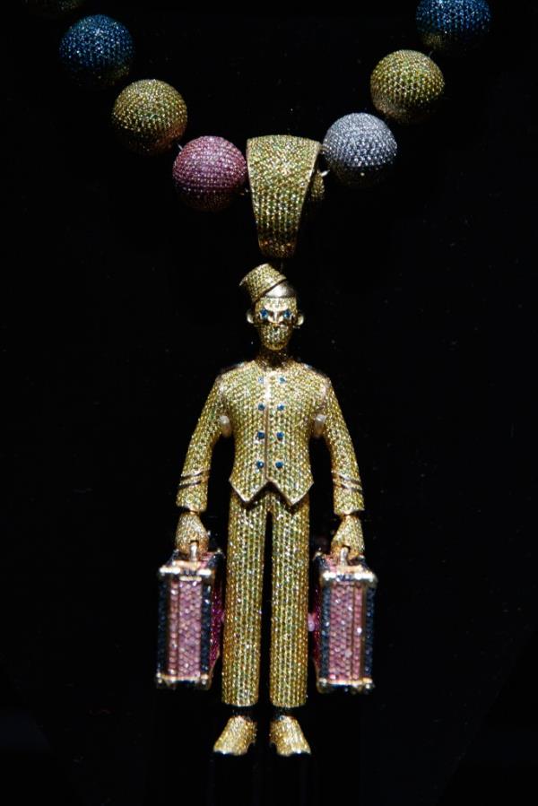 Tyler, The Creator's bellhop pendant necklace on display at the Ice Cold: An Exhibition of Hip-Hop Jewelry, featuring 23,000 hand-set stones, 186 carats of diamonds, and 60 carats of sapphire