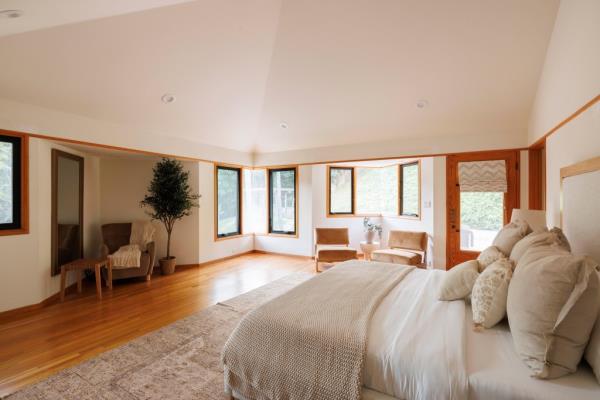 Another sunlit bedroom with rectangular windows