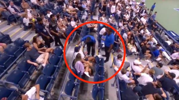 Security at the U.S. Open talks to an unruly fan.