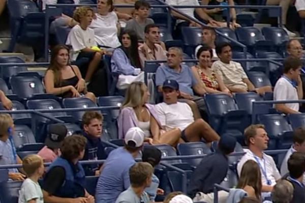 A fan wearing a blue hat and white tshirt was ejected from the match.