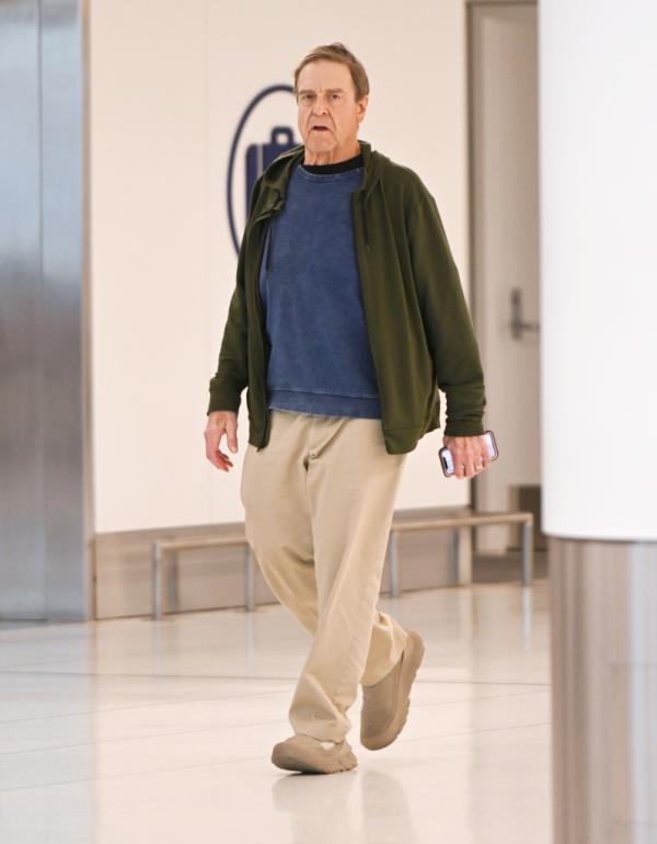 The pictures of Goodman signing autographs comes one day after he and his wife, Anna Beth, were pictured arriving at JFK airport. 