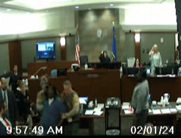 After Langham was handcuffed, court officials cleared out all the inmates from the courtroom.