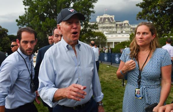 Joe Biden and Annie Tomasini standing outside during the White House Co<em></em>ngressional Picnic in Washington DC