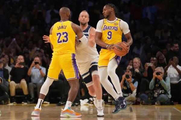 Los Angeles Lakers guard Bro<em></em>nny James handling the ball during an NBA basketball game against the Minnesota Timberwolves