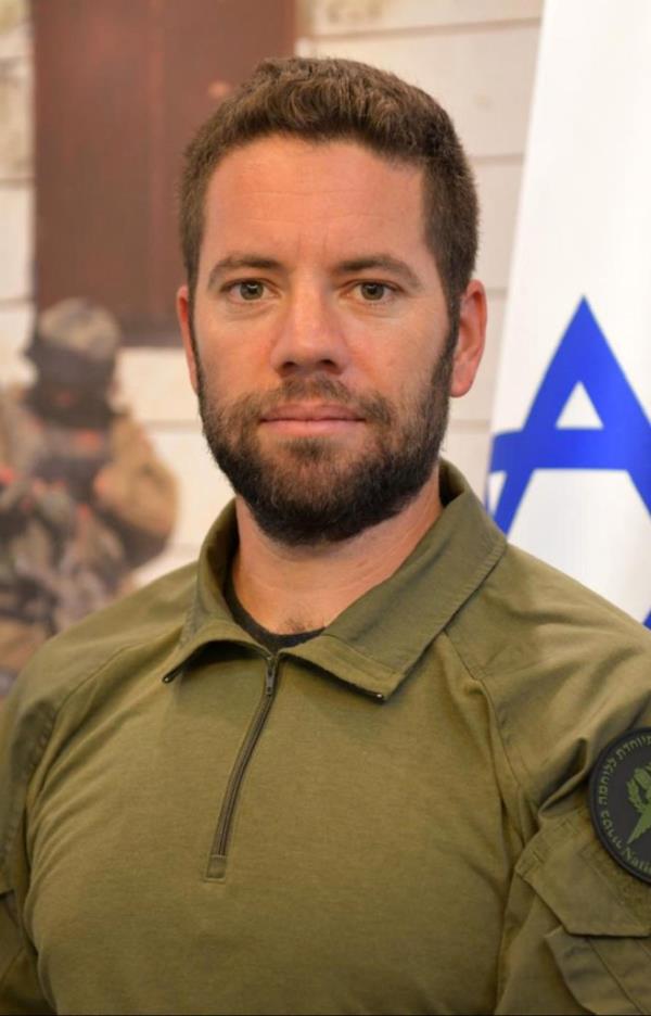 Chief Inspector Arnon Zmora in a green shirt, from the Yamam elite counter-terrorism unit, who died during the hostage rescue operation in Gaza