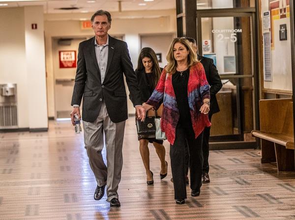 Deborah and Kim Clenney walk out of the courtroom after hearing, Miami, Dec. 8, 2022.