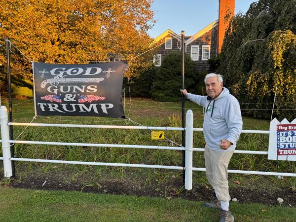 Andy Sabin of Amagansett with his Do<em></em>nald Trump lawn signs