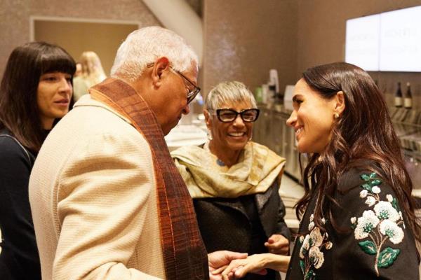 Meghan Markle's mom Doria Ragland and Tina Knowles at LA art event, with Meghan Markle and Prince Harry in the background