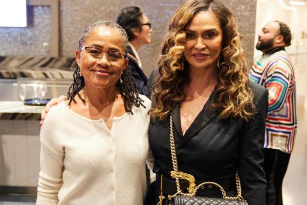 Doria Ragland and Tina Knowles posing together at an LA art event