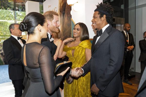 Prince Harry, Meghan, Beyoncé and Jay-Z shaking hands at the European premiere of Disney's 'The Lion King' in London, England
