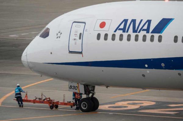 All Nippon Airways aircraft sit on the tarmac at Haneda airport in Tokyo