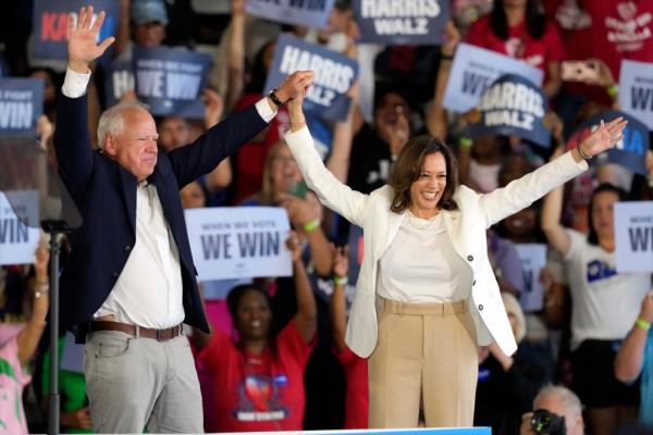 Vice President Kamala Harris and Minnesota Gov. Tim Walz arriving at a campaign rally in Romulus, Michigan on August 7, 2024