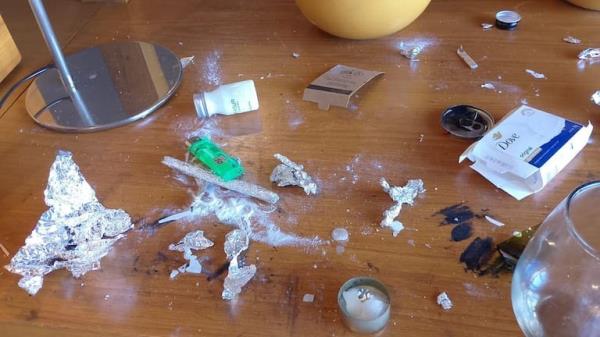The images what appear to show drugs and alcohol were taken inside the singers hotel room.