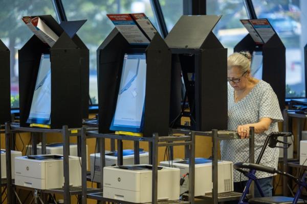 Voters casting their ballots at an early voting location in Columbus, Georgia for the 2024 Presidential Election