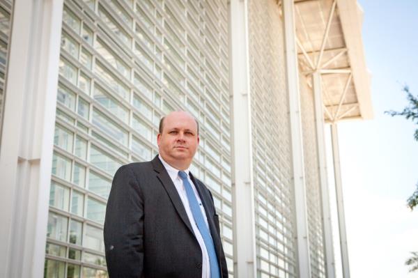 Attorney Marc Elias standing outside the Sandra Day O'Co<em></em>nnor United States Courthouse in Phoenix, AZ, after a hearing for a voting rights lawsuit in August 2016.