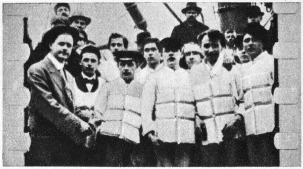 Members of the ship's crew in their life jackets.