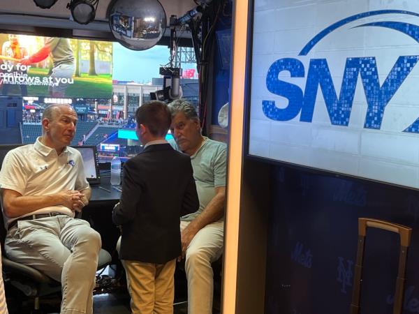 Gary Cohen and Keith Hernandez with Kidcaster Co<em></em>nest winner Kingston Nahm-Korn.