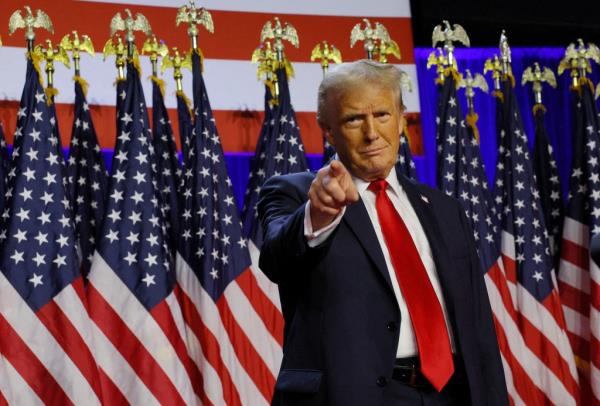 Republican presidential nominee and former U.S. President Do<em></em>nald Trump takes the stage to address supporters at his rally, at the Palm Beach County Co<em></em>nvention Center in West Palm Beach, Florida, U.S., November 6, 2024.