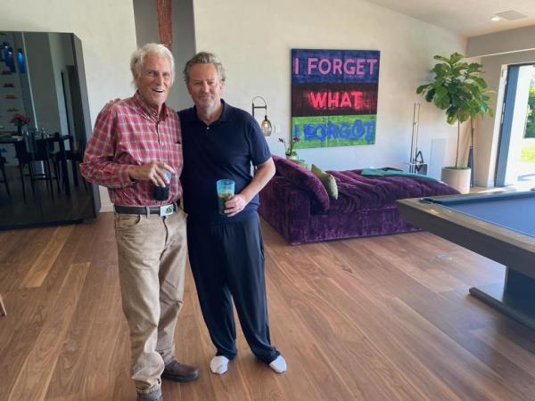  with his dad, actor John Bennett Perry