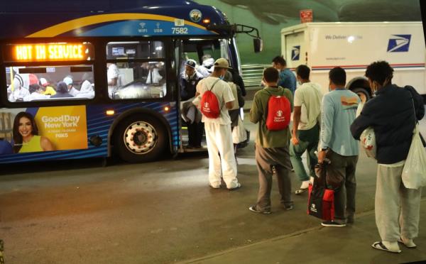 The Bus Terminal in Manhattan at 42nd Street and 8th Avenue wher<em></em>e migrants from Texas are arriving at the terminal and then leave the terminal in MTA Buses to a family or to an all male shelter in the city.