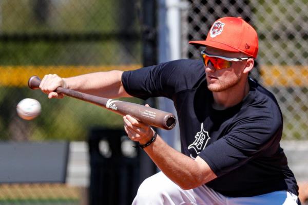 Detroit Tigers outfielder Parker Meadows bunts during spring training at TigerTown