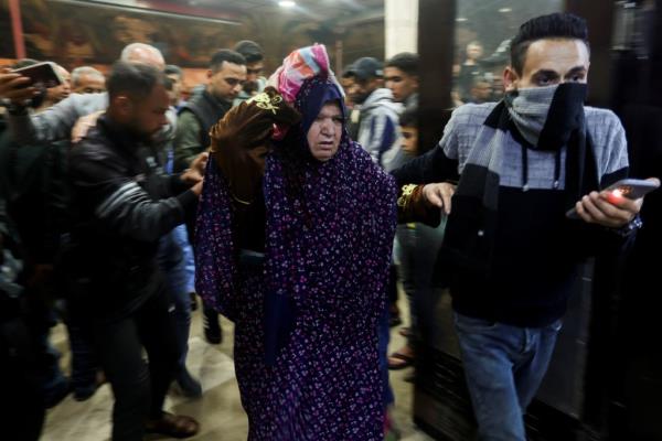 An injured Palestinian woman getting rushed to Nasser hospital in Khan Younis.