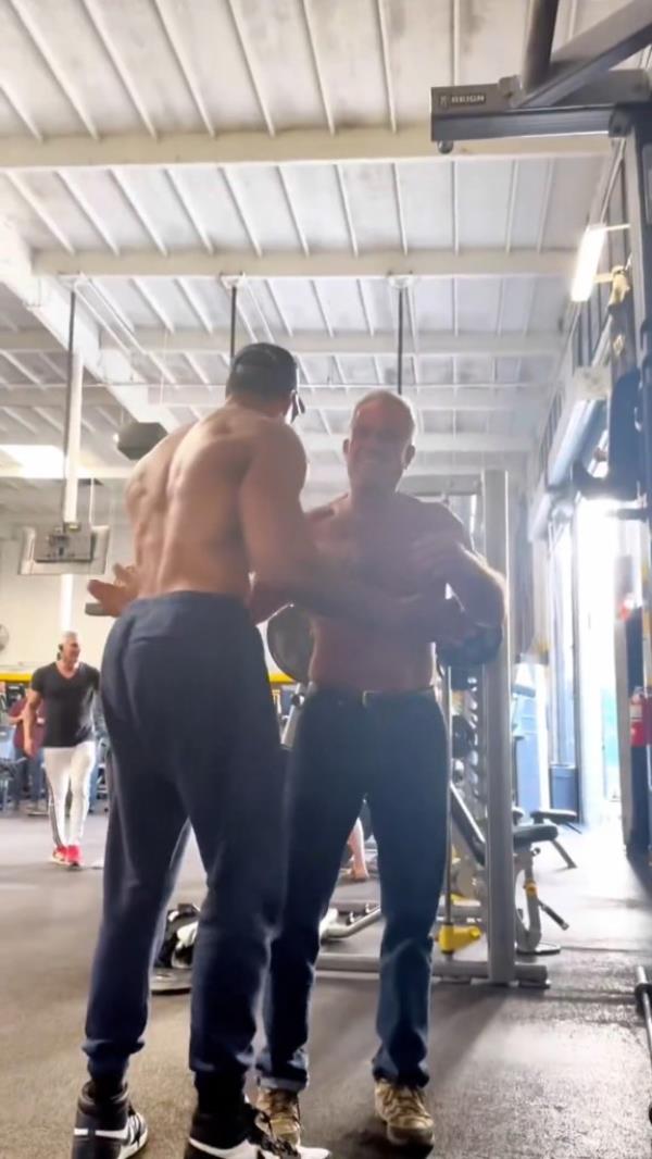 The gym rats co<em></em>ngratulated each other on a successful workout routine.