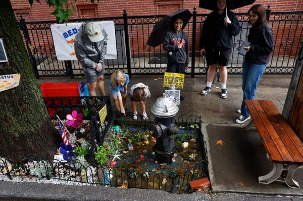 The fire hydrant goldfish pond at 48 Tompkins Avenue in Bedford Stuyvesant, Brooklyn