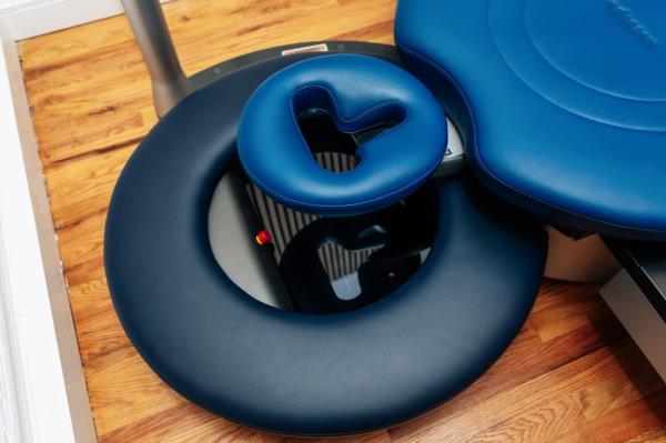 Aescape Headquarters in Manhattan featuring a blue cushio<em></em>ned massage chair, photographed on July 8, 2024, by Emmy Park for NY Post.