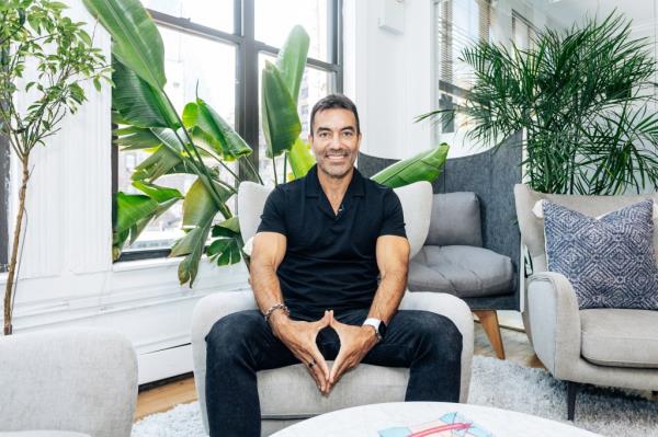 Eric Litman, founder of Aescape, sitting in a chair in Manhattan on July 8, 2024.